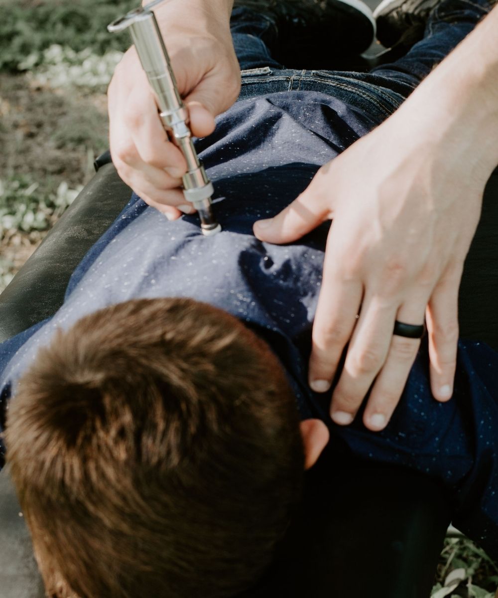 young boy having a chiropractic adjustment
